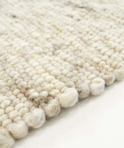 Tapis en laine tissé main Ylva - beige - close up zijkant, thumbnail Tapis en laine tissé main Ylva - beige - close up zijkant, thumbnail