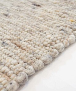 Tapis en laine tissé main Ylva - beige/gris - close up zijkant, thumbnail Tapis en laine tissé main Ylva - beige/gris - close up zijkant, thumbnail