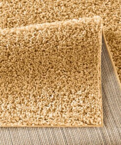 Tapis poils longs Spectrum - jaune moutarde - close up vouw, thumbnail