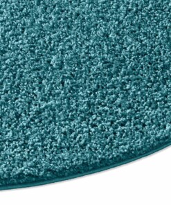Tapis poils longs Rond Spectrum - turquoise - close up zijkant, thumbnail Tapis poils longs Rond Spectrum - turquoise - close up zijkant, thumbnail