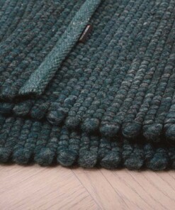 Tapis laine Lett - bleu canard - close up vouw, thumbnail