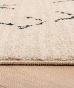 Tapis style berbère Beni Ouarain Soufiane - Crème/noir - close up zijkant, thumbnail