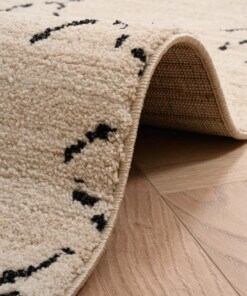 Tapis style berbère Beni Ouarain Soufiane - Crème/noir - close up vouw, thumbnail