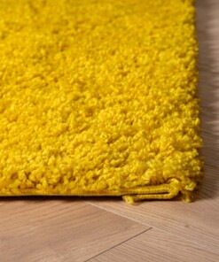 Tapis Carré poils longs Shaggy Trend - jaune - close up hoek