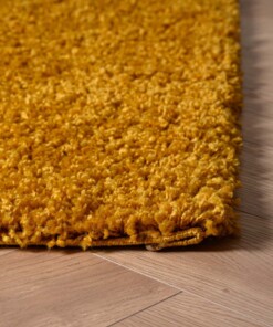 Tapis Carré poils longs Shaggy Trend - jaune moutarde - close up hoek