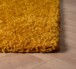 Tapis Carré poils longs Shaggy Trend - jaune moutarde - close up hoek, thumbnail