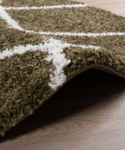 Tapis poils longs Rond losange Artisan - vert olive/blanc - close up zijkant, thumbnail Tapis poils longs Rond losange Artisan - vert olive/blanc - close up zijkant, thumbnail