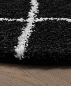 Tapis poils longs Rond losange Artisan - noir/blanc - close up zijkant, thumbnail Tapis poils longs Rond losange Artisan - noir/blanc - close up zijkant, thumbnail