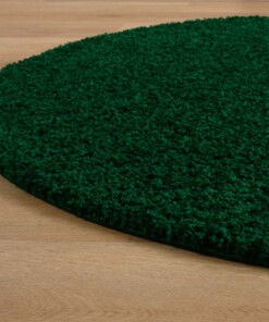 Tapis ovale poils longs - Shaggy Trend vert émeraude - close up zijkant, thumbnail Tapis ovale poils longs - Shaggy Trend vert émeraude - close up zijkant, thumbnail