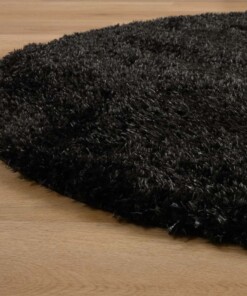 Tapis ovale poils longs - Posh anthracite - close up zijkant, thumbnail Tapis ovale poils longs - Posh anthracite - close up zijkant, thumbnail
