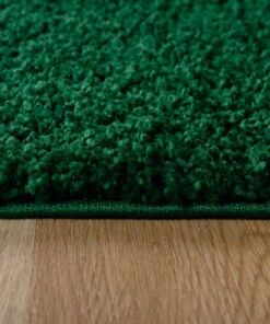 Tapis ovale poils longs - Shaggy Trend vert émeraude - close up zijkant, thumbnail Tapis ovale poils longs - Shaggy Trend vert émeraude - close up zijkant, thumbnail