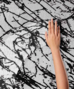 Tapis lavable aspect marbre - Chloé blanc/noir Tapis lavable aspect marbre - Chloé blanc/noir