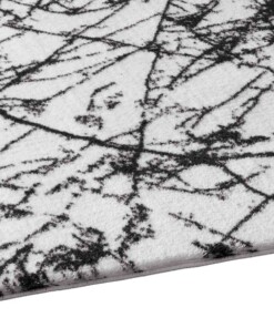 Tapis lavable aspect marbre - Chloé blanc/noir - close up zijkant, thumbnail Tapis lavable aspect marbre - Chloé blanc/noir - close up zijkant, thumbnail