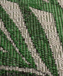 Tapis d'extérieur Feuilles de palmier - Coastal Cliffs vert - close up
