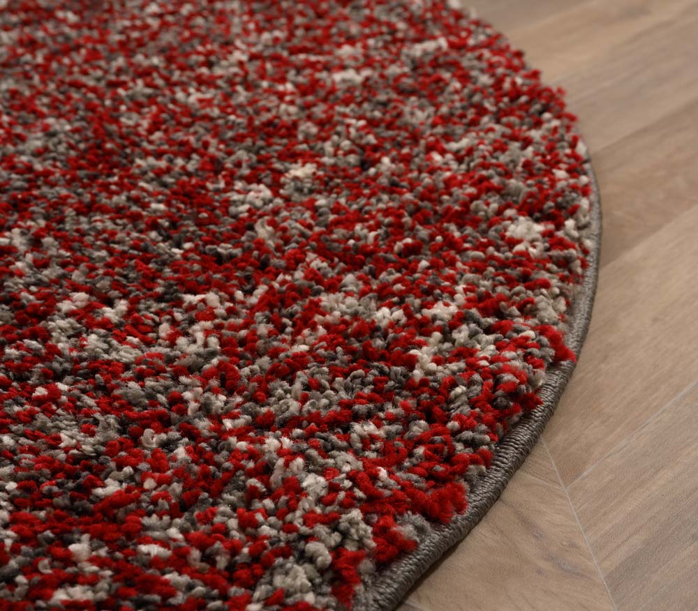 Tapis rond poils longs - Blend rouge/gris - close up Tapis rond poils longs - Blend rouge/gris - close up