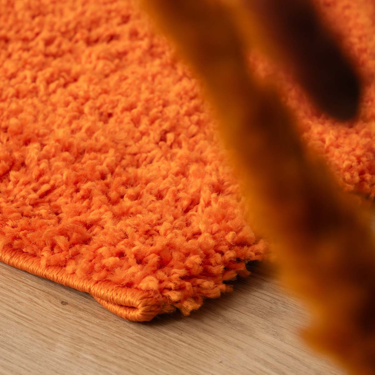 Tapis Carré poils longs Shaggy Trend - orange - close up Tapis Carré poils longs Shaggy Trend - orange - close up