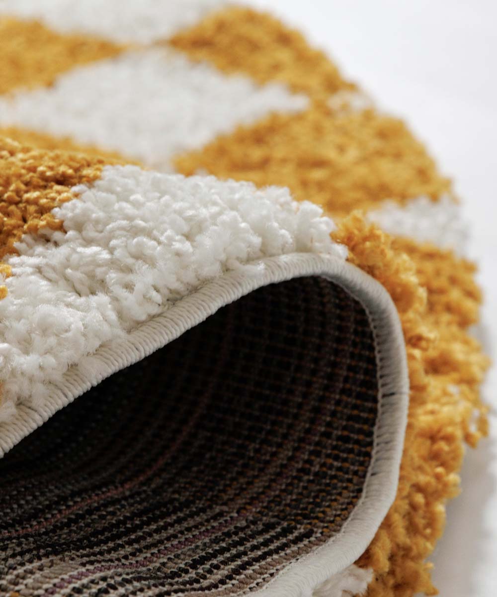 Tapis rond rétro - Check ivoire/or - close up Tapis rond rétro - Check ivoire/or - close up