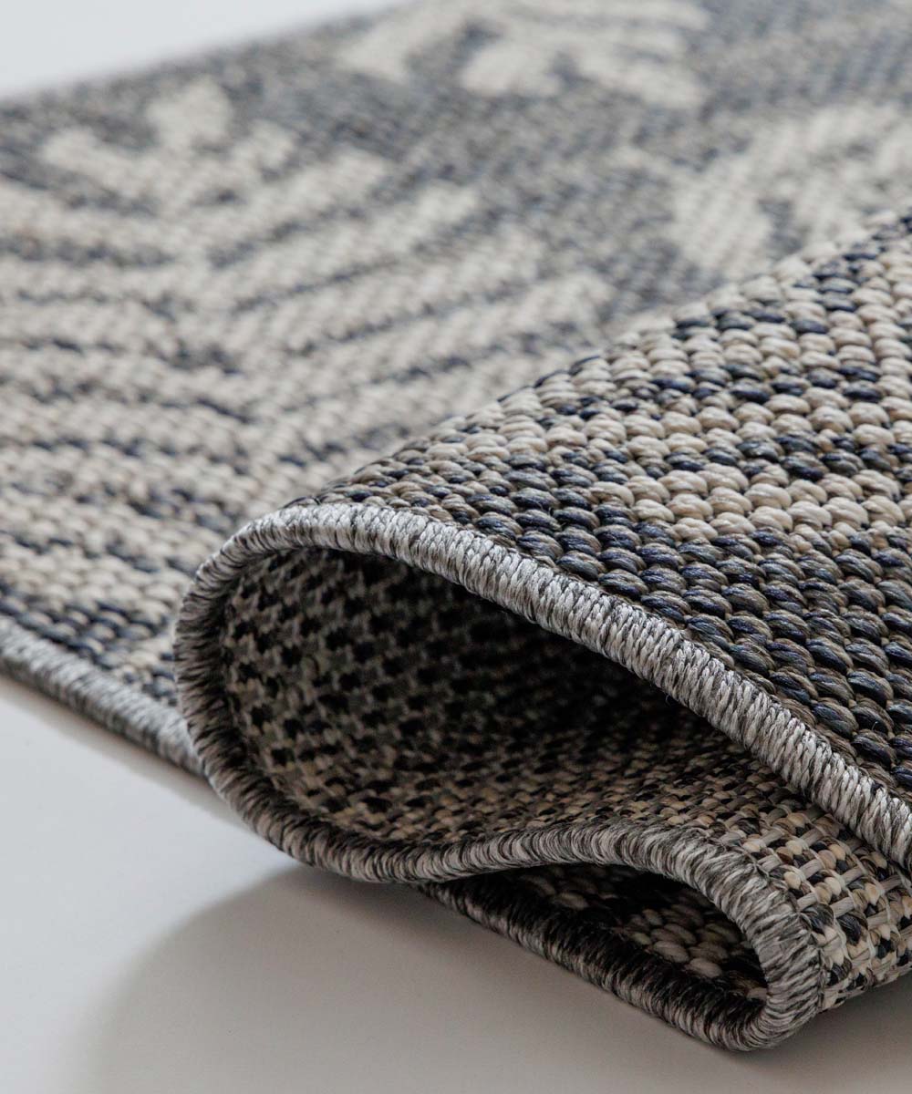 Tapis d'extérieur Carré Feuilles de palmier - Sunny gris foncé - close up Tapis d'extérieur Carré Feuilles de palmier - Sunny gris foncé - close up