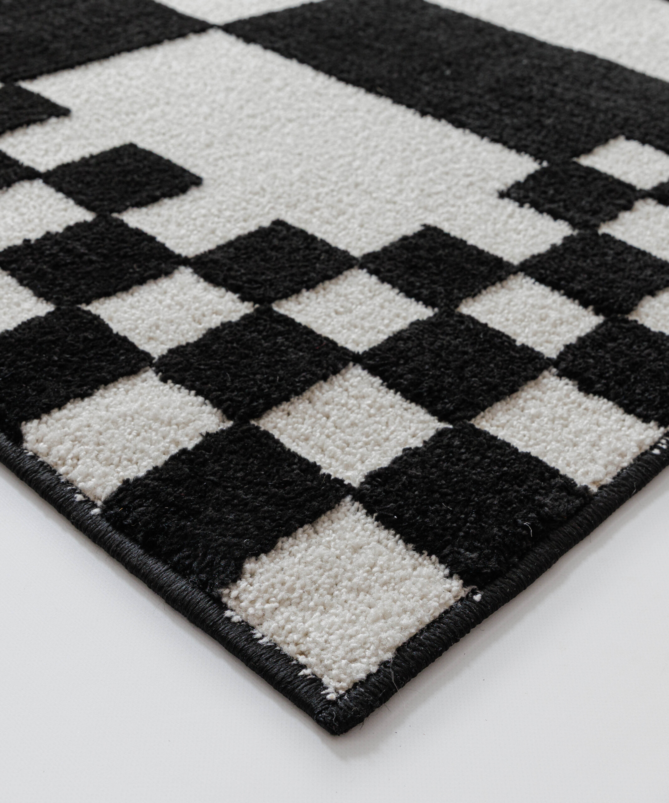 Tapis damier - Nivo Maeve blanc/noir - close up Tapis damier - Nivo Maeve blanc/noir - close up