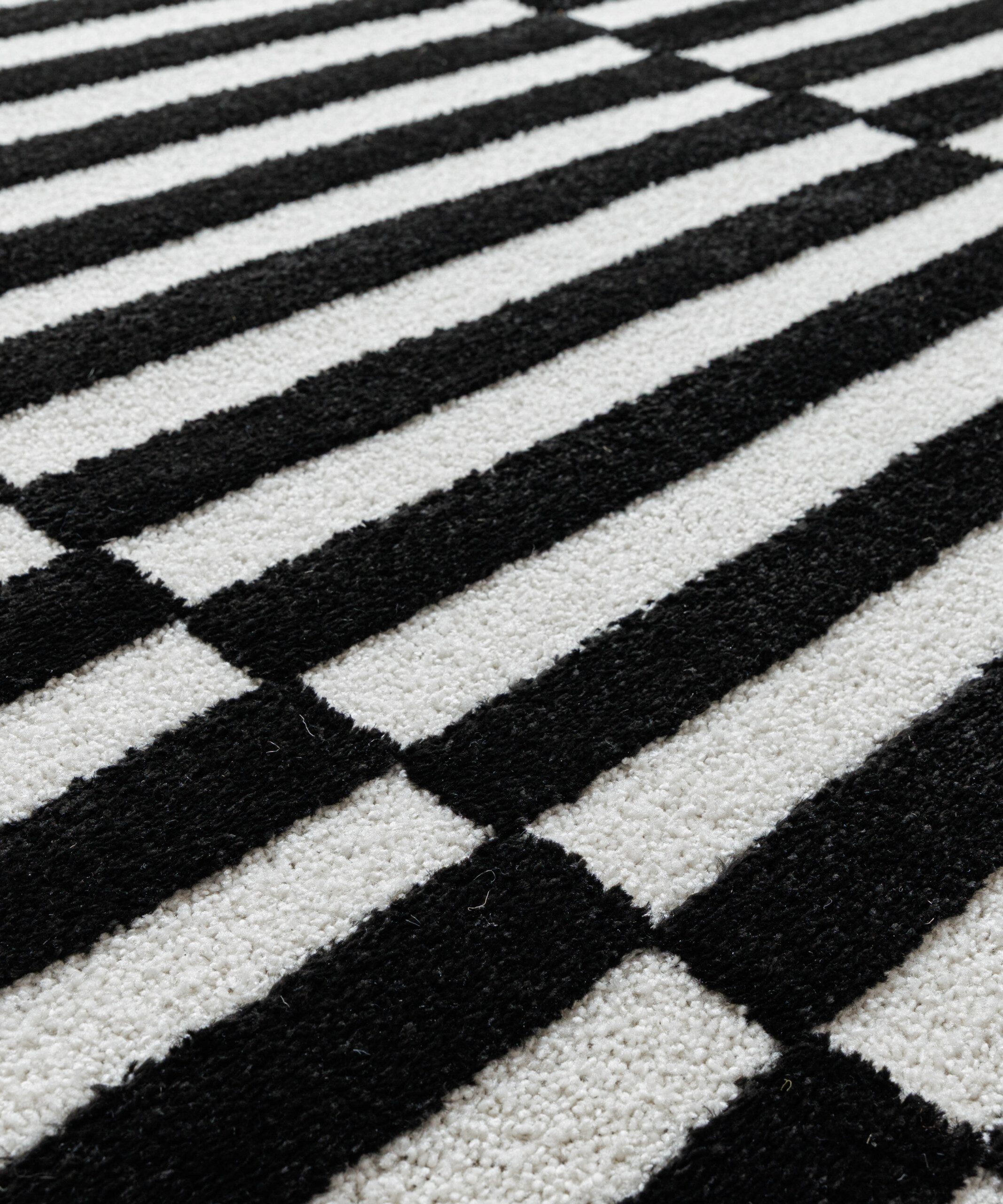 Tapis poil ras - Nivo Step crème/noir - close up Tapis poil ras - Nivo Step crème/noir - close up