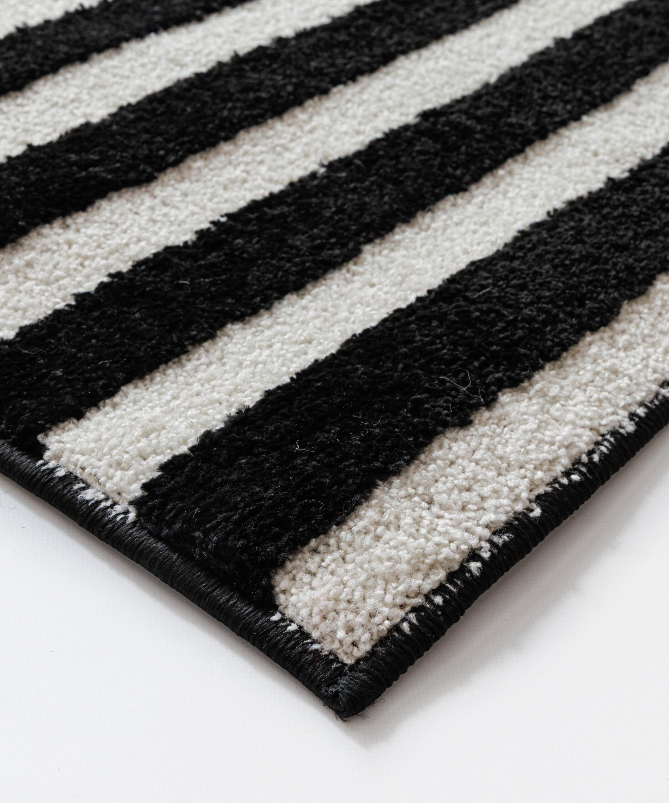 Tapis poil ras - Nivo Step crème/noir - close up Tapis poil ras - Nivo Step crème/noir - close up
