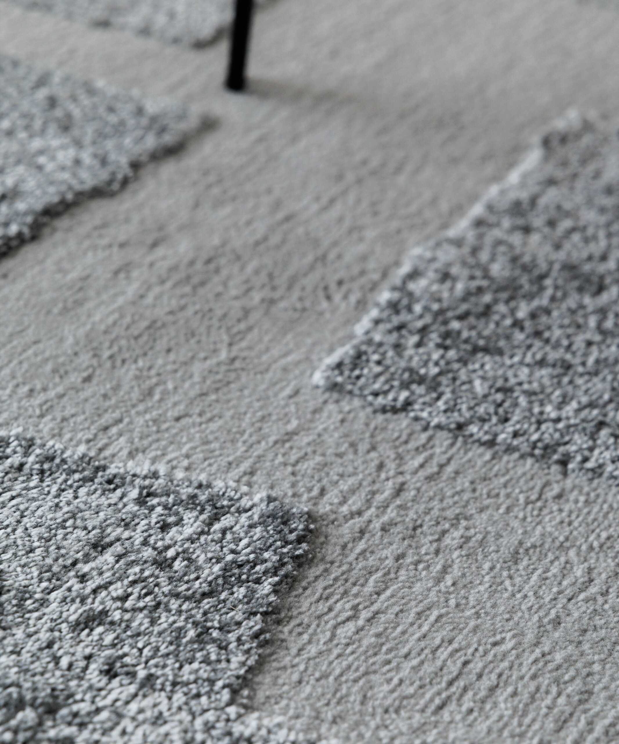 Tapis Rond scandinave - Contour Stone gris - close up Tapis Rond scandinave - Contour Stone gris - close up