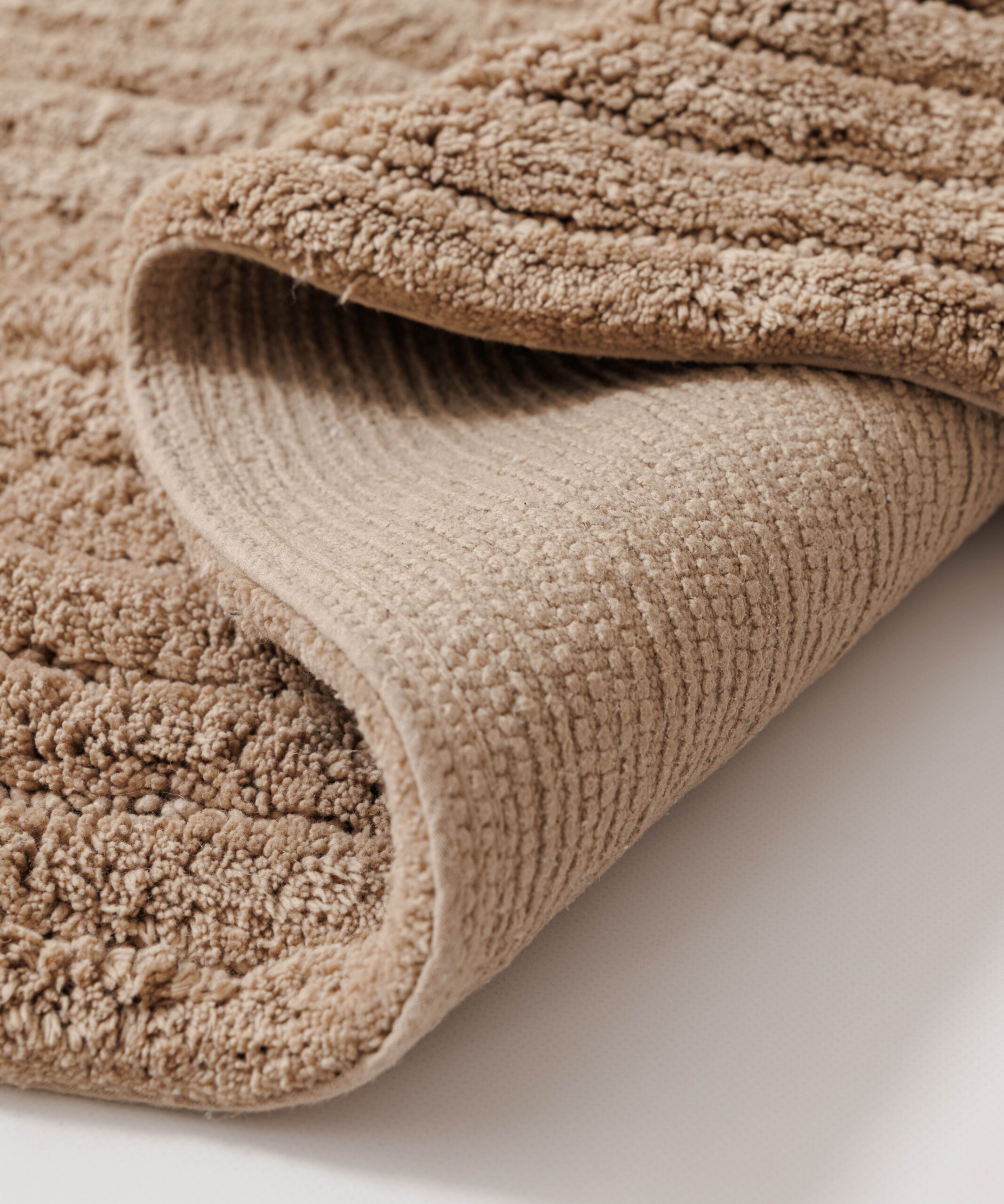 Tapis de bain ovale - Stille beige - close up Tapis de bain ovale - Stille beige - close up