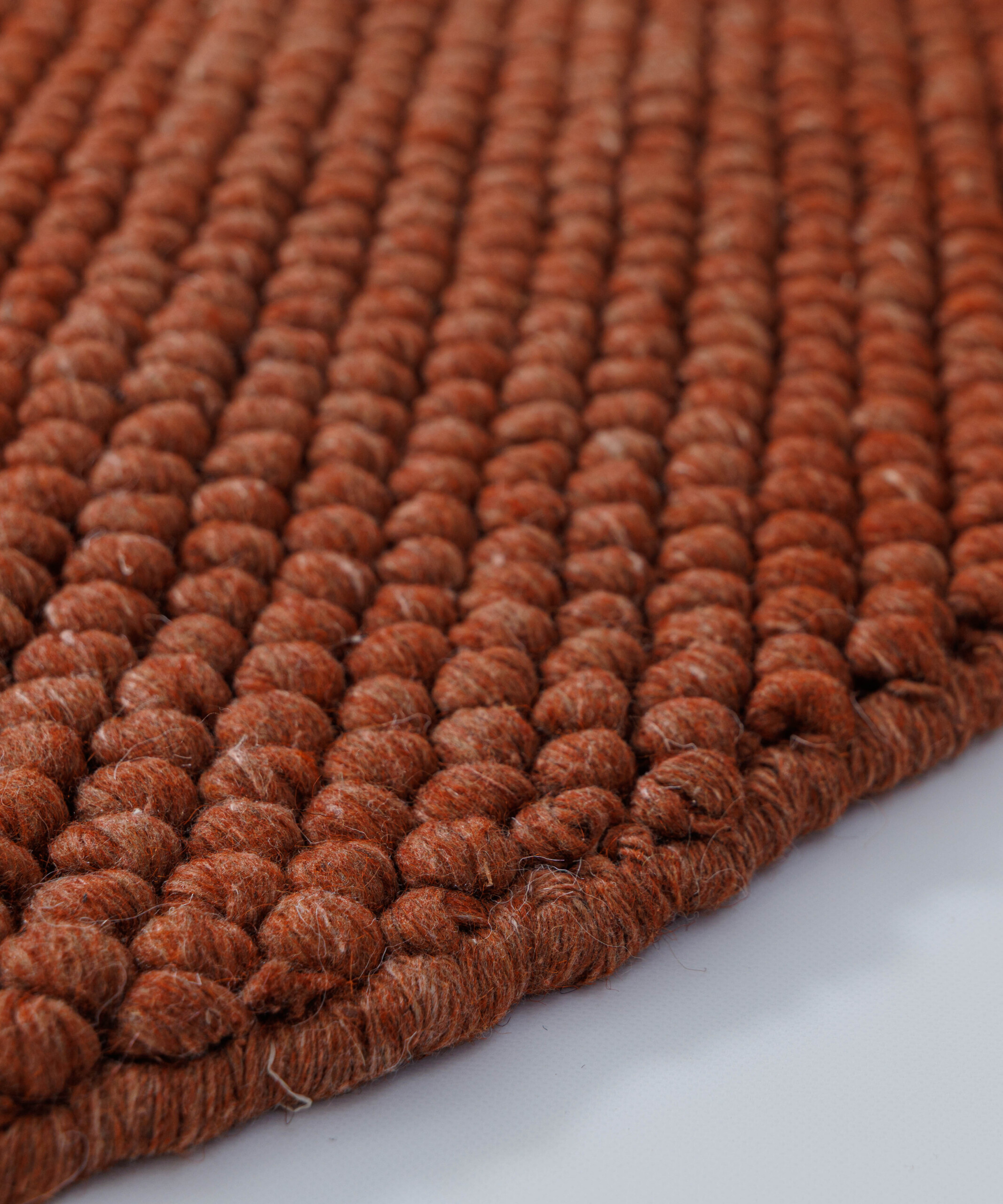 Tapis laine rond - Fjell terre cuite - close up Tapis laine rond - Fjell terre cuite - close up