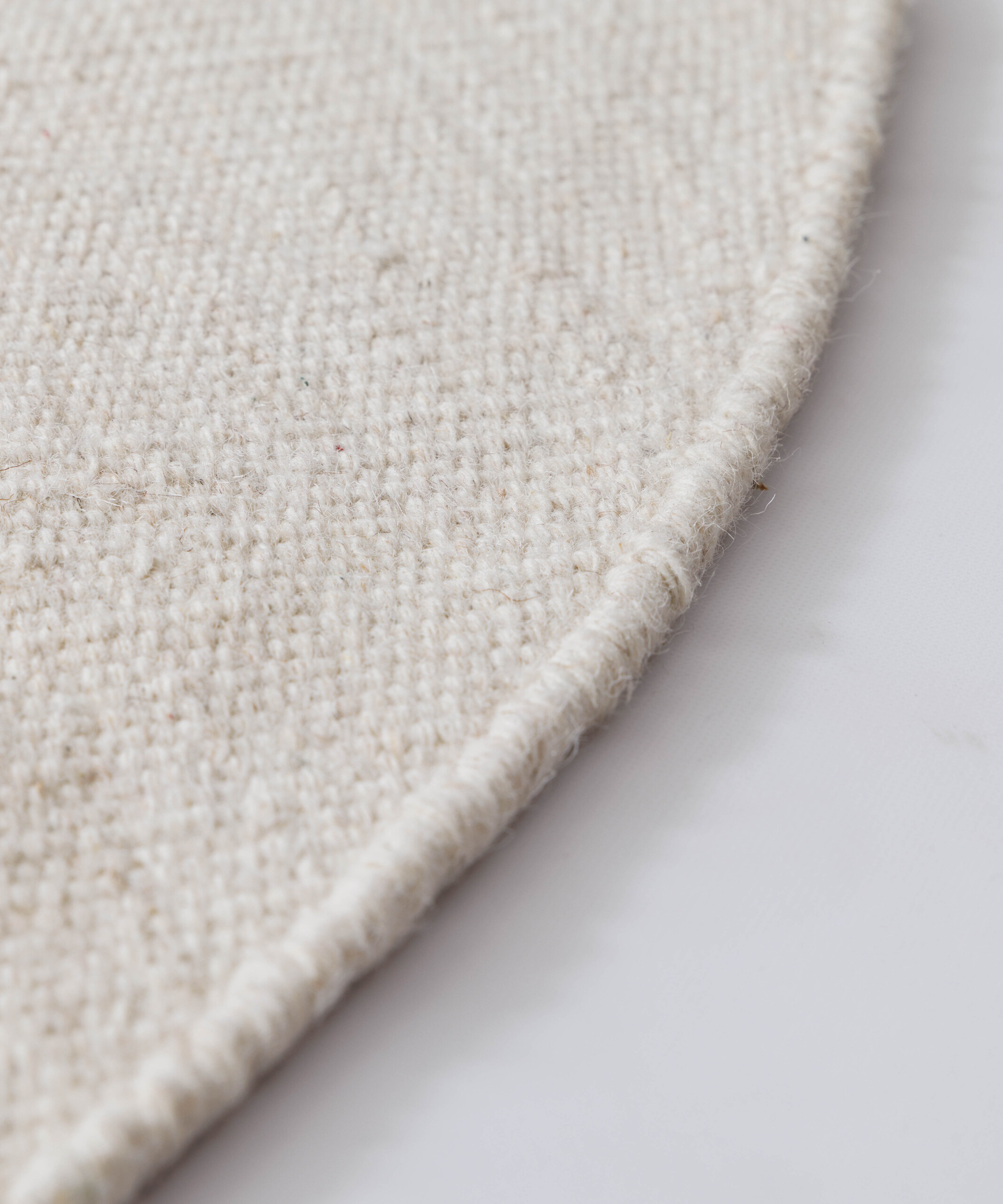 Tapis rond en laine - Grund ivoire - close up Tapis rond en laine - Grund ivoire - close up