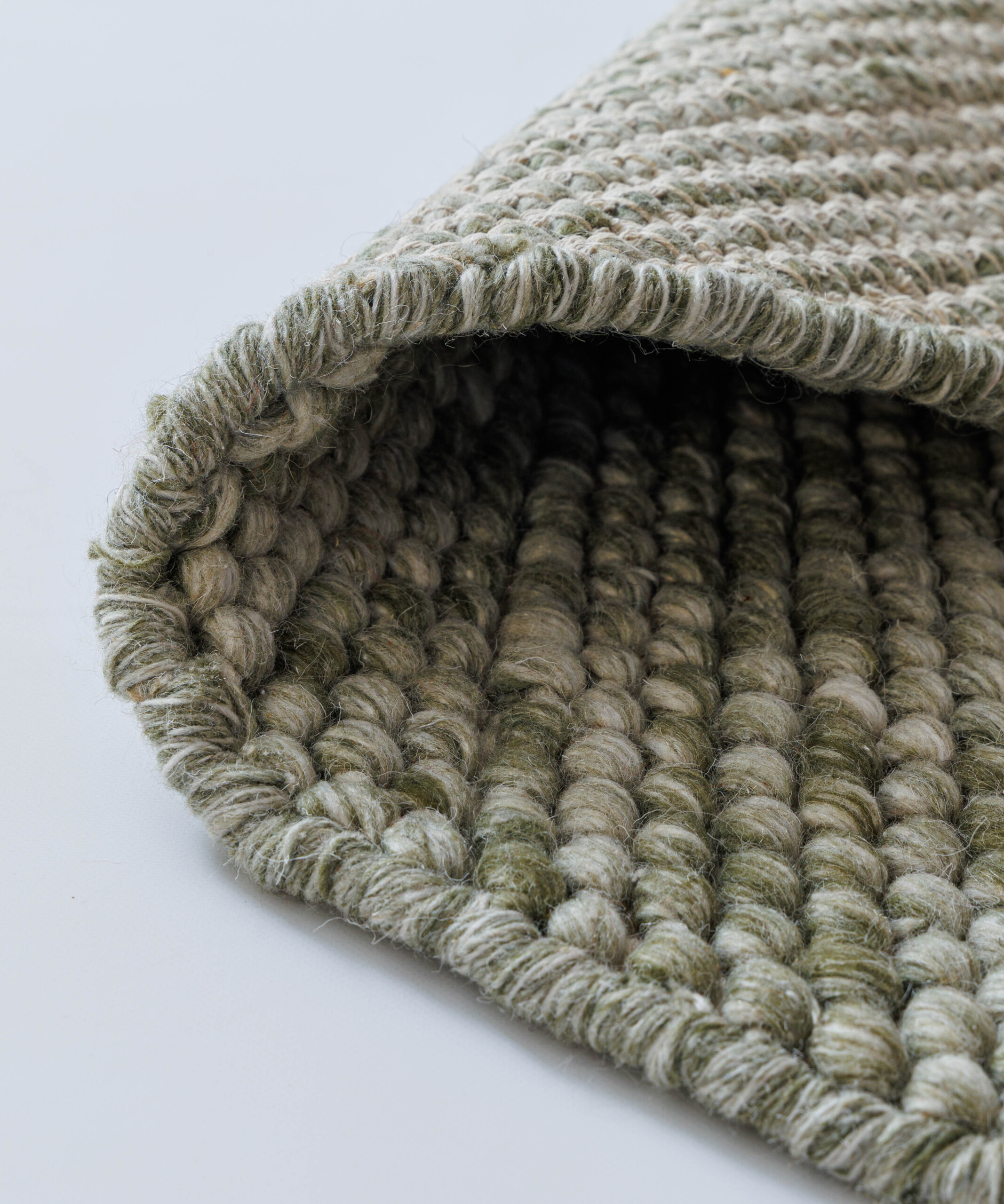 Tapis laine rond - Løkke vert olive - close up Tapis laine rond - Løkke vert olive - close up
