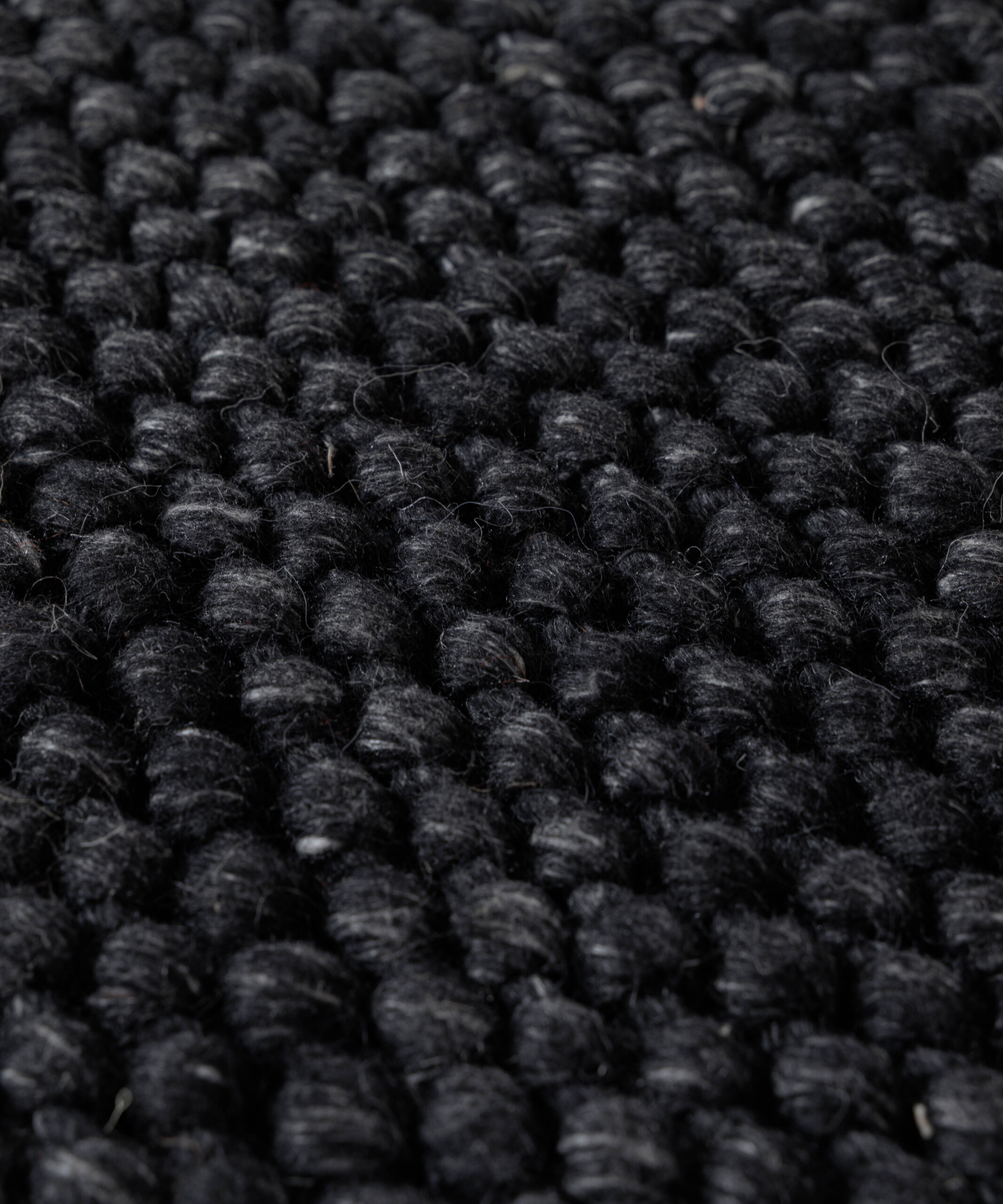 Tapis laine rond - Løkke noir - close up Tapis laine rond - Løkke noir - close up