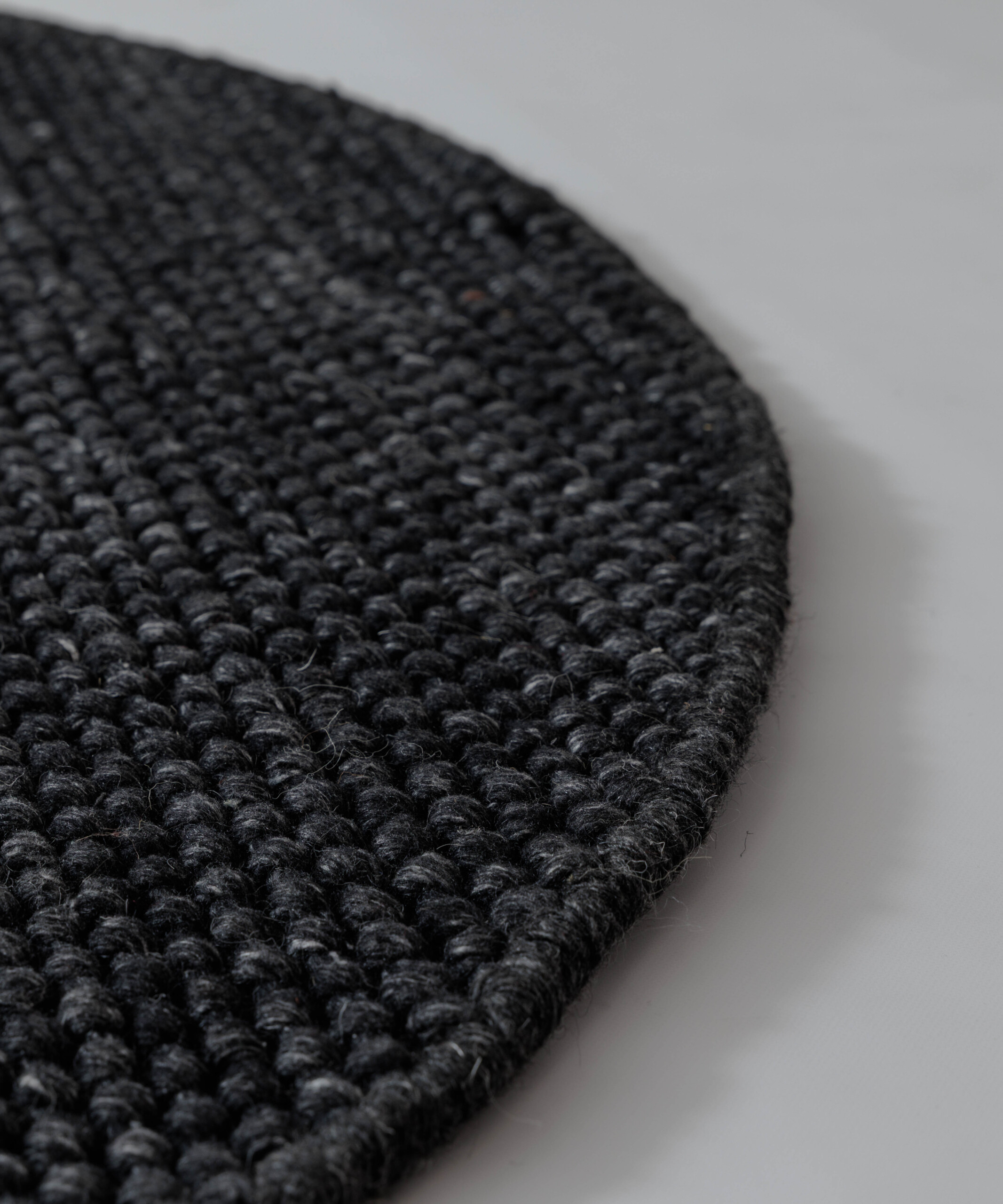 Tapis laine rond - Løkke noir - close up Tapis laine rond - Løkke noir - close up