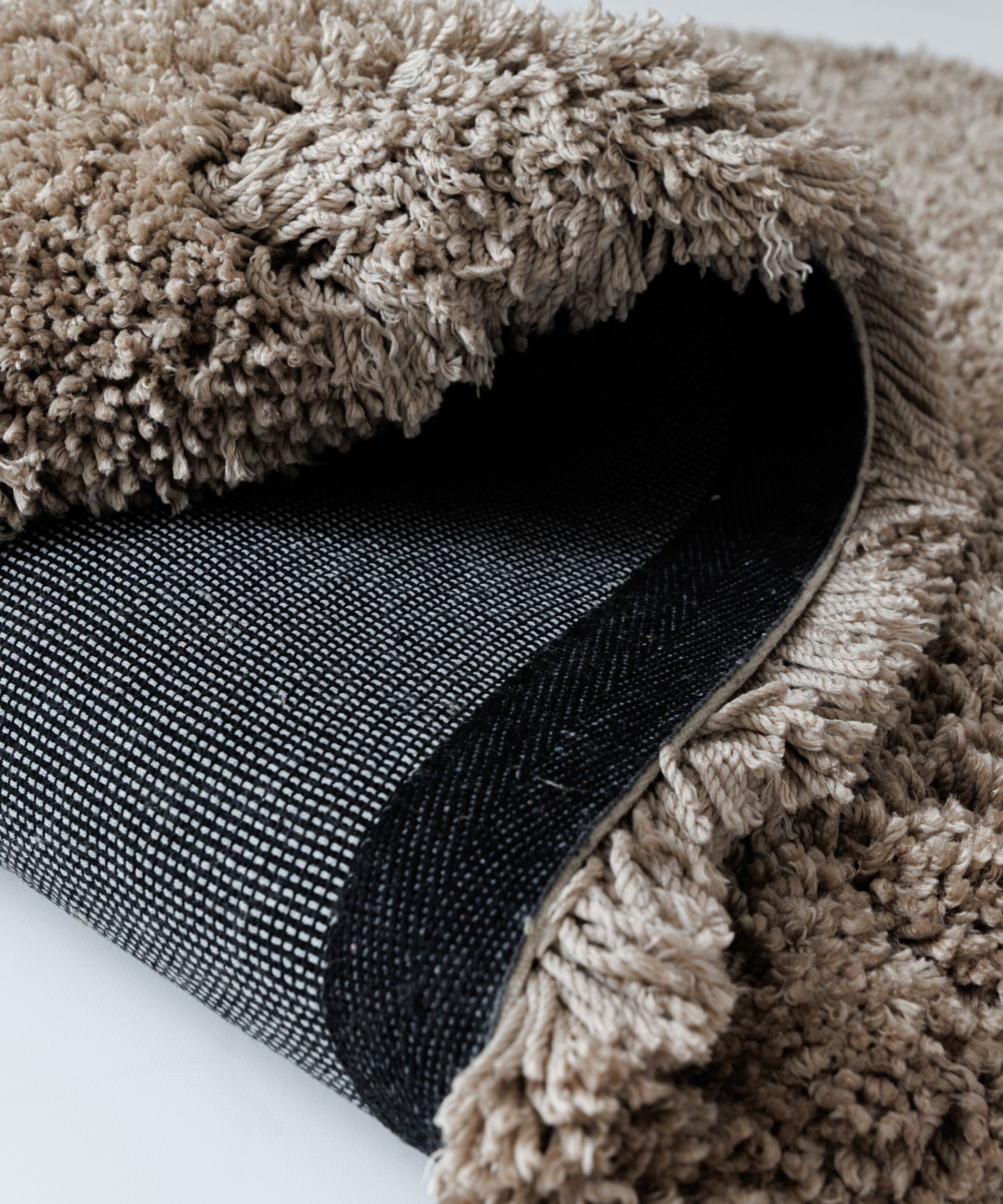 Tapis shaggy - Sveve couleur du sable - close up Tapis shaggy - Sveve couleur du sable - close up