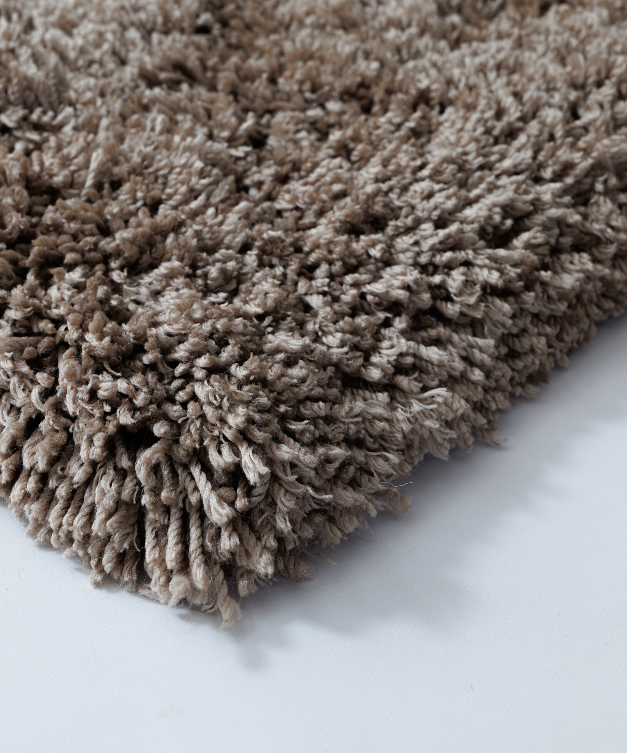 Tapis shaggy - Sveve couleur du sable - close up Tapis shaggy - Sveve couleur du sable - close up